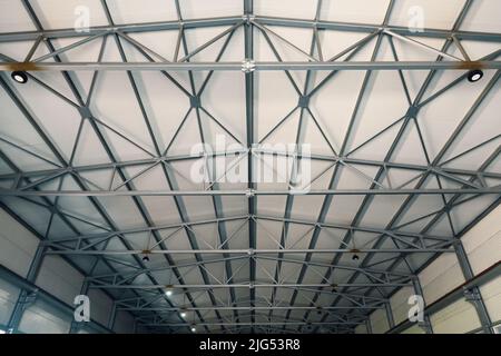 steel construction of the hall roof with insulating panels Stock Photo