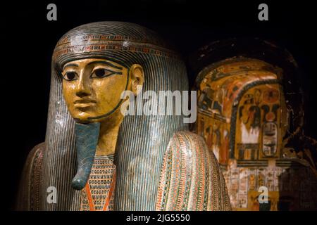 Leiden, The Netherlands - JAN 04, 2020: opened old wooden sarcophagus of pharaoh from ancient Egypt. At exhibition Gods of Egypt. Stock Photo