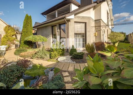 two-story concrete or brick country house Stock Photo