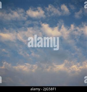 Horizontal cloud formation before sunset Stock Photo