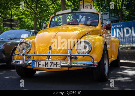 BERLIN - JUNE 18, 2022: Economy car Volkswagen Beetle convertible. Classic Days Berlin. Stock Photo
