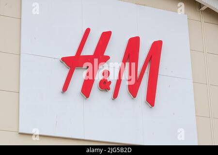 LIVERPOOL, U.K; JULY/07/2022; H&M Logo, H & M Hennes & Mauritz AB or H&M Group is a multinational clothing company based in Sweden. Stock Photo