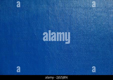 Blue texture. Fine texture of surface of painted board. Lots of points. Glare on board. Stock Photo