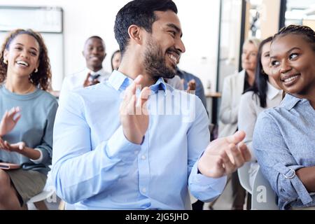 That was great. Cropped shot of a group of businesspeople applauding during a seminar in the conference room. Stock Photo