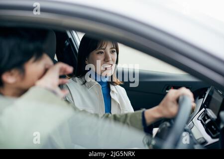 Japanese couple having a drive together Stock Photo