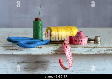Still life with sewing accessories. Vintage. Stock Photo
