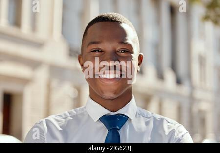 Ready to get my future started. Shot of a young businessman standing in the city. Stock Photo