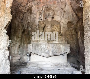 Carved statues of Longmen Grottoes (Longmen Caves). The complex was inscribed as a UNESCO World Heritage. Stock Photo