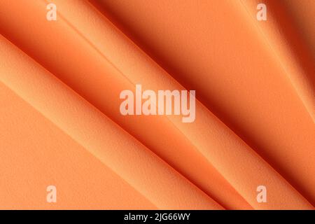 Bright orange silk cotton fabric texture background Stock Photo
