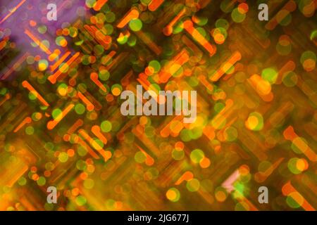 Green and orange highlights, abstract bokeh, romantic background. Stock Photo