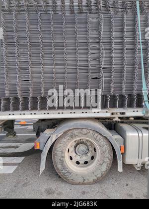 Reinforcing bars framework for armored concrete construction. Layers stacked and stowed for transport Stock Photo