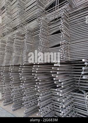 Reinforcing bars framework for armored concrete construction. Layers stacked and stowed for transport Stock Photo