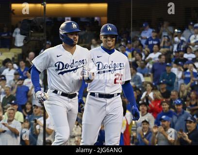 Los Angeles, United States. 08th July, 2022. Los Angeles Dodgers Gavin Lux (L) is greeted by teammate Trayce Thompson after hitting a two-run homer off Chicago Cubs starting pitcher Mark Leiter Jr. during the second inning at Dodger Stadium in Los Angeles on Thursday, July 7, 2022. The Dodgers beat the Cubs 5-3. Photo by Jim Ruymen/UPI Credit: UPI/Alamy Live News Stock Photo