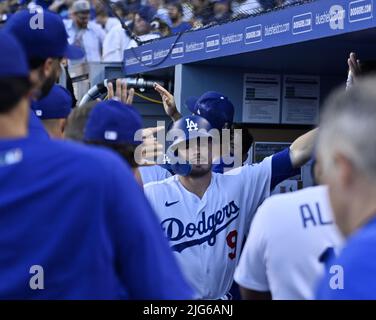 Los Angeles, United States. 08th July, 2022. Los Angeles Dodgers Gavin Lux celebrates with teammates in the dugout after hitting a two-run homer off Chicago Cubs starting pitcher Mark Leiter Jr. during the second inning at Dodger Stadium in Los Angeles on Thursday, July 7, 2022. The Dodgers beat the Cubs 5-3. Photo by Jim Ruymen/UPI Credit: UPI/Alamy Live News Stock Photo