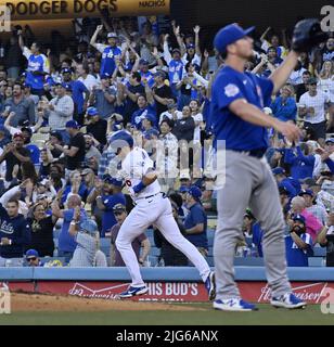 Los Angeles, United States. 08th July, 2022. Los Angeles Dodgers Gavin Lux rounds the bases after hitting a two-run homer off Chicago Cubs starting pitcher Mark Leiter Jr. (R) during the second inning at Dodger Stadium in Los Angeles on Thursday, July 7, 2022. The Dodgers beat the Cubs 5-3. Photo by Jim Ruymen/UPI Credit: UPI/Alamy Live News Stock Photo