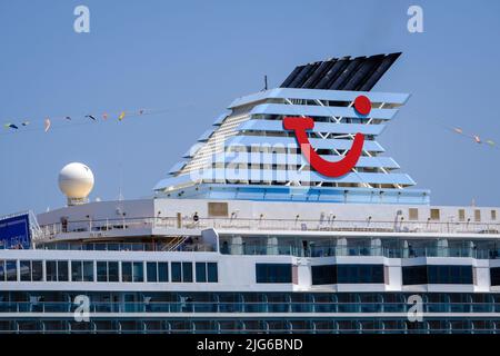 Corfu Town, Corfu, Greece - TUI cruise ship Marella Explorer is moored in the port of Corfu. The 262 meter long ship has a mass of 9,900 tons. Stock Photo