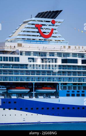 Corfu Town, Corfu, Greece - TUI cruise ship Marella Explorer is moored in the port of Corfu. The 262 meter long ship has a mass of 9,900 tons. Stock Photo