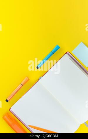 Open sheet notepad with pen and markers. Back to school concept, drawing. Copy space Stock Photo