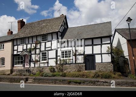 Medieval black and white half timbered houses in the mediaeval village of Pembridge in Arrow Valley Herefordhire UK Stock Photo