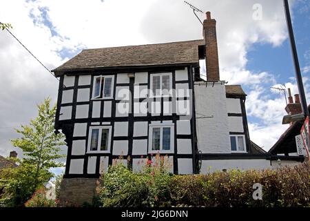 Medieval black and white half timbered houses in the mediaeval village of Pembridge in Arrow Valley Herefordhire UK Stock Photo