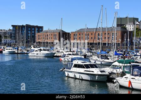 View across Milford marina towards Nelson Quay, Milford Haven, Pembrokeshire, Wales Stock Photo