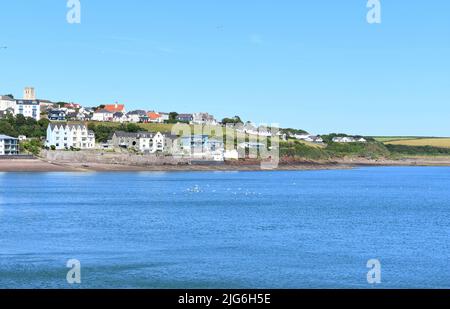 View across the water to the eastern end of Milford Haven town from Mackerel Quay, Milford Haven, Pembrokeshire, Wales Stock Photo