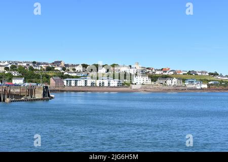 View across the water to the eastern end of Milford Haven town from Mackerel Quay, Milford Haven, Pembrokeshire, Wales Stock Photo