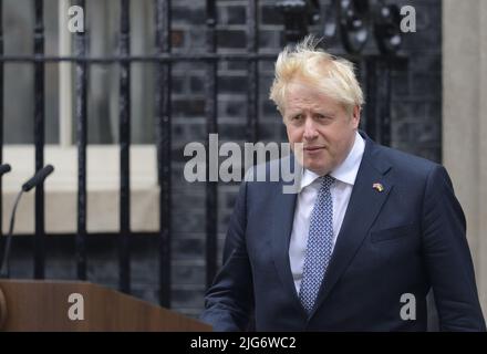 British Prime Minister Boris Johnson exiting No 10 before delivering his resignation speech in Downing Street, 7th July 2022. Stock Photo