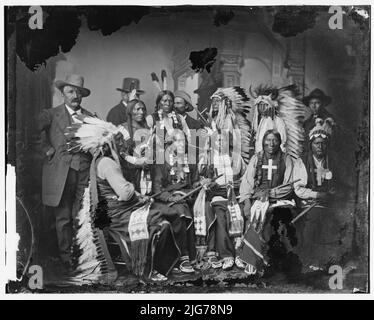 Sioux and Arrapahoe Indian Delegations, between 1865 and 1880. L to R, seated: Red Cloud, Big Road, Yellow Bear, Young Man Afraid of his Horses, Iron Crow. L to R, standing: Little Bigman, Little Wound, Three Bears, He Dog. Stock Photo