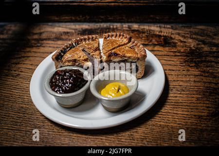 Pork pie ,english mustard at Ye Olde Mitre Public House, London, UK Stock Photo