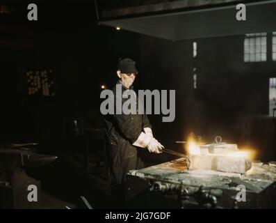 John Kelseh [i.e., Kelsch], blacksmith, at his forge in the blacksmith shop at the roundhouse, Rock Island R.R., Blue Island, Ill. Stock Photo