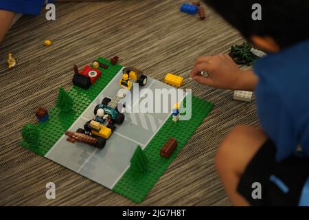 little boy playing lego. building blocks. Stock Photo