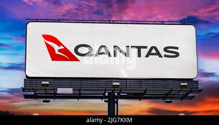 POZNAN, POL - JUN 28, 2022: Advertisement billboard displaying logo of Qantas Airways, the flag carrier of Australia Stock Photo