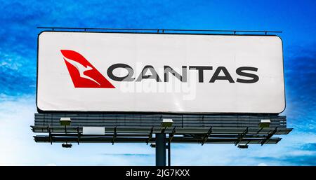 POZNAN, POL - JUN 28, 2022: Advertisement billboard displaying logo of Qantas Airways, the flag carrier of Australia Stock Photo