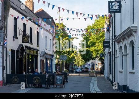 Poole High Street, evening view with people dining at Renoufs Cheese and Wine Bar, Poole, Dorset, England, UK Stock Photo