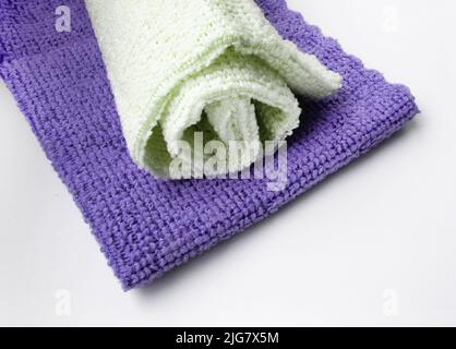 Close-up of two microfiber cleaning cloths, top view. Lying flat, a copy of the space. Stock Photo