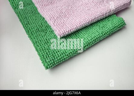 Close-up of two microfiber cleaning cloths, top view. Lying flat, a copy of the space. Stock Photo