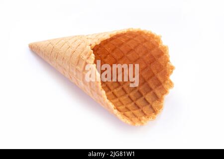 Single empty wafer ice cream cone isolated on white background. Top view Stock Photo