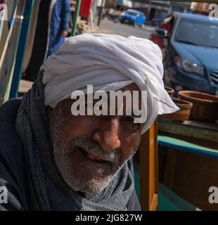 Hurghada, Egypt - February 21, 2022: Happy old arab man portrait Stock Photo