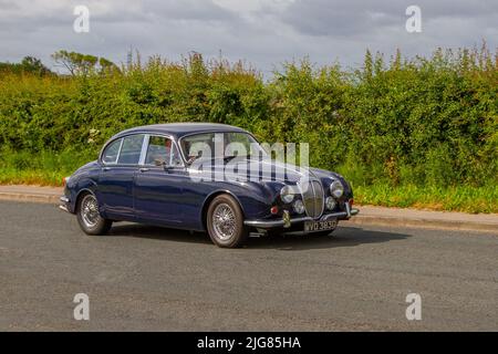 1969 blue Daimler V8 250 2548cc luxury saloon en route to Hoghton Tower for the Supercar Summer Showtime car meet which is organized by Great British Motor Shows in Preston, UK Stock Photo