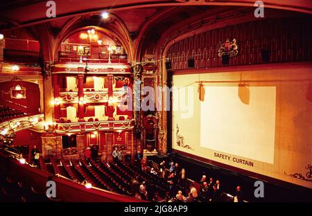 Bristol Hippodrome Theatre, St Augustine's Parade, Bristol, City of Bristol, 1970 - 2015. A view from the side of the grand circle in the Bristol Hippodrome Theatre, showing the proscenium arch, safety screen, and boxes to the side of the stage. The Bristol Hippodrome Theatre opened in 1912. The auditorium is largely unaltered despite the building being damaged by fire in the 1940s. Stock Photo