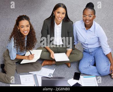 Women doing it for themselves. Shot of a team of businesswomen working together during a meeting. Stock Photo
