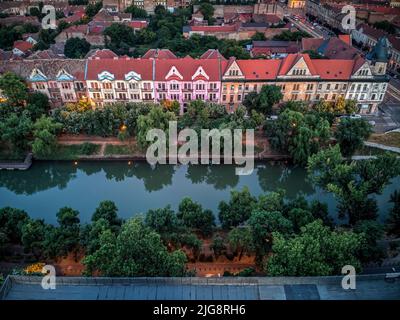 Aerial view of Bega River shore at the blue hour. Drone photo taken on 26th of June 2022, in Timisoara, Timis county, Romania. Stock Photo