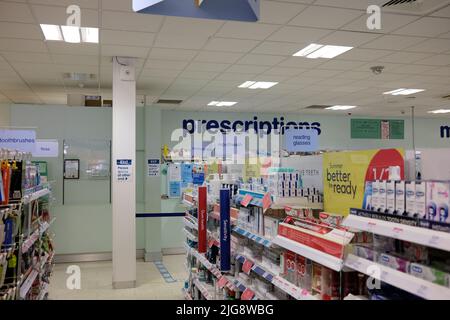 Prescriptions counter at Boots pharmacy, England, UK Stock Photo - Alamy