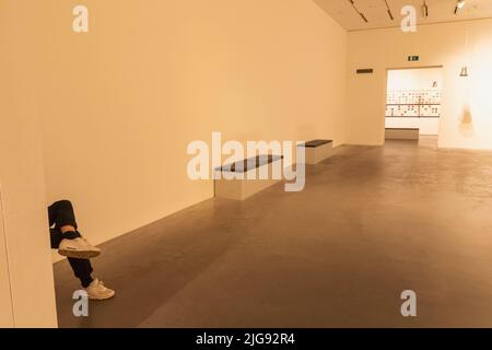 England, London, Southwark, Bankside, Tate Modern Art Gallery, Legs and Empty Room Stock Photo