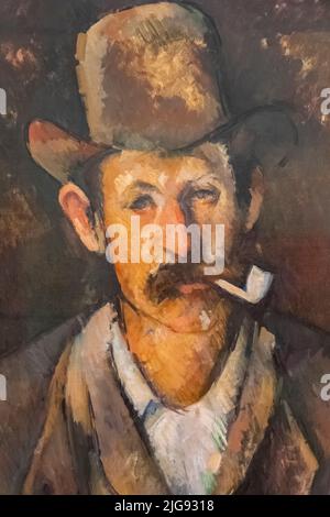 England, London, Somerset House, The Courtauld Gallery, Painting titled 'Man with a Pipe' by Paul Cezanne dated 1894 Stock Photo