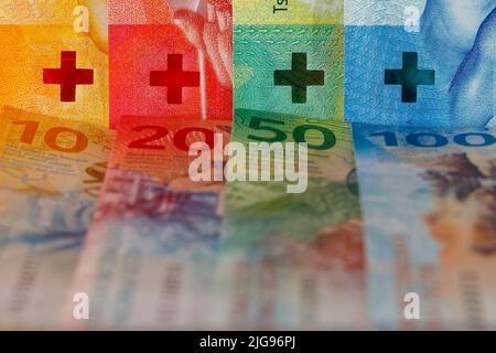 New Swiss banknotes of various denominations. These new banknotes are the eighth series of banknotes which were introduced between 2016 and 2019. Stock Photo