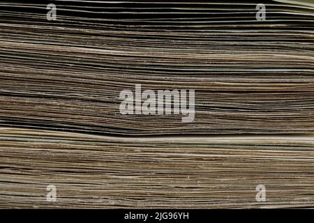 The stack of banknotes is shown so close up that the edges of the banknotes placed one on top of the other form a background. This money is Polish zlo Stock Photo