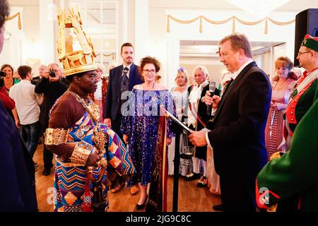 08 July 2022, Rhineland-Palatinate, Bad Dürkheim: Céphas Bansah, African king residing in Rhineland-Palatinate, attends the award ceremony of the 'Goldener Winzer' of the carnival society 'Derkemer Grawler' in the Kurhaus. The award is given to celebrities who have rendered outstanding services in socially important areas. Bansah has lived in Ludwigshafen since 1970 and cares for more than 300,000 people from the Ewe people in Ghana from a distance. Photo: Uwe Anspach/dpa Stock Photo