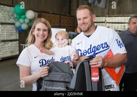 Los Angeles Dodgers infielder Max Muncy, wife Kellie Muncy and daughter Sophie Muncy pose at Dodgers Foundation and MLB All-Star Legacy initiative project, Friday, July 8, 2022, in Los Angeles. Stock Photo